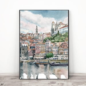 K&ouml;nnte beinhalten: Aquarellmalerei einer Stadtlandschaft mit einem Fluss im Vordergrund. Die Stadt ist an einem Hang gebaut und verf&uuml;gt &uuml;ber eine hohe Kirche mit einem Turm. Der Fluss ist ruhig und spiegelt die Geb&auml;ude und den Himmel wider. Es befinden sich Boote auf dem Wasser.