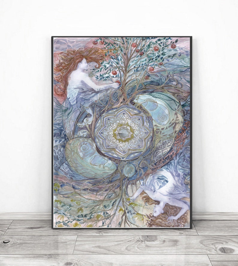 May include: A framed watercolor print featuring a mystical scene with two figures, a tree with red fruit, and a central mandala design. The artwork uses a palette of blues, greens, and earth tones, creating a dreamlike atmosphere. The print is displayed in a black frame.