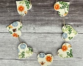 A Wooden Heart Bunting Decoupaged in Emma Bridgewater 39 s Dandelion Cream