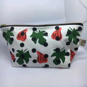 Green and pink cosmetics bag