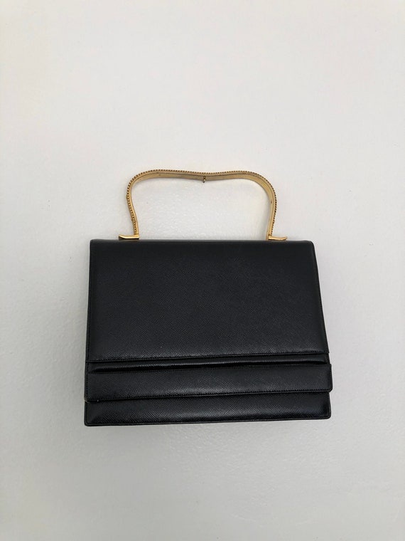 vintage 1950s black leather brass top handle bag