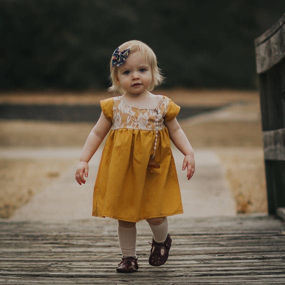 mustard baby dress