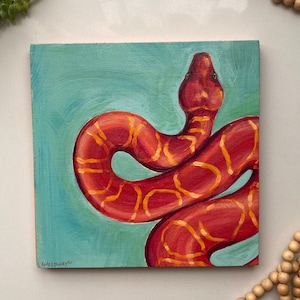 Snake on Green- original acrylic painting on 8x8 wood panel. Coral reds and yellow snake on a vibrant green
