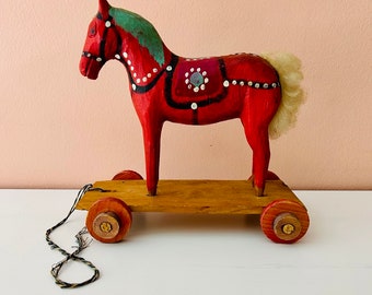 Vintage primitive painted horse // antique rustic wood horse on wheels toy // farmhouse dala Scandinavian antique decor