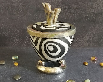 black and white urn for ashes with circles pattern, various colors and sizes: 61 / 42 / 24 / 12 cubic inches capacity, for human or pet