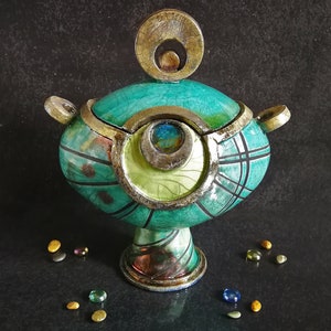 Raku ceramic "peacock eye" urn for human or pet ashes, capacity 2.2 liters (134 cubic inches), customizable color