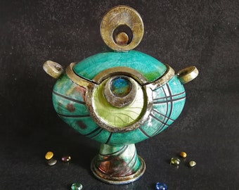 Raku ceramic "peacock eye" urn for human or pet ashes, capacity 2.2 liters (134 cubic inches), customizable color