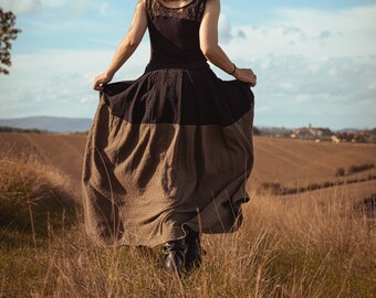 Demetra model long skirt in black and green muslin with elastic waistband and pockets. Size 38/44 with elastic waist.