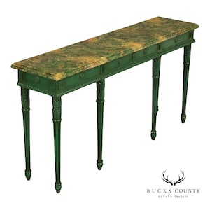 May include: A long, narrow console table featuring a rectangular top with a mottled green and gold faux marble finish. The frame is painted a solid dark green and includes four slender, fluted legs with carved leaf details at the top.