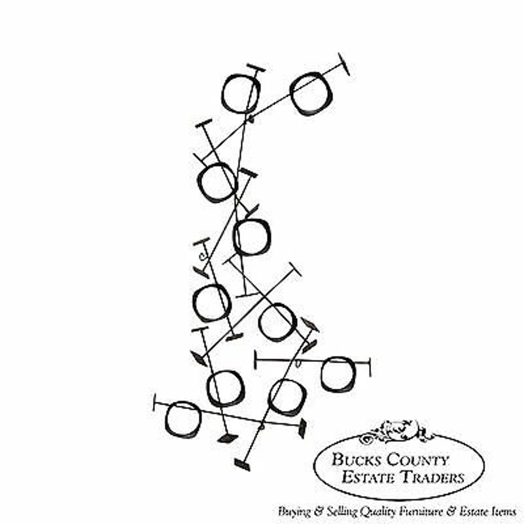 Mid Century Modern Geometric Iron Wall Sculpture manner of Curtis Jere