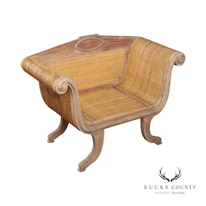 May include: A light brown wooden chair featuring a woven cane seat and backrest. The chair has a curved frame with scrolled armrests and four outward-curving legs. A decorative oval medallion is centered on the top rail of the backrest.