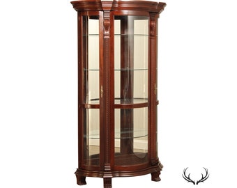 Philip Reinisch Company Bow Front Illuminated Curio Cabinet