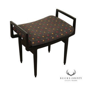 May include: Black wooden bench with a dark gray cushion featuring a colorful diamond pattern.