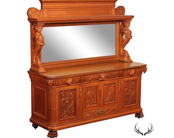 Antique Renaissance Revival Figural Carved Oak Mirrored Sideboard
