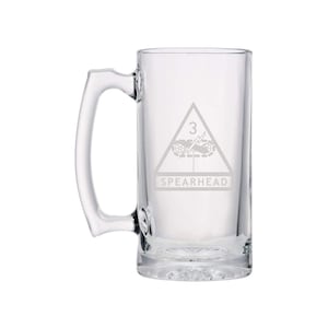 May include: A clear glass beer stein with a white etched design of the 3rd Infantry Division's insignia, a triangle with a lightning bolt and a tank, and the text "SPEARHEAD".
