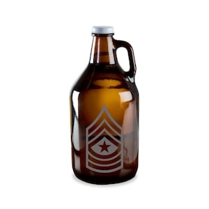 May include: A brown glass growler with a white metal cap and a handle. The growler features a silver graphic of a military rank insignia with a star. The bottle is designed to carry beverages.