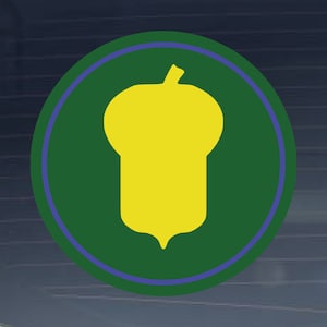 May include: A green circle with a blue outline, featuring a yellow acorn in the centre.