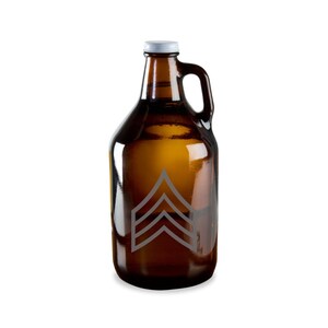 May include: A brown glass growler with a white metal cap and a handle. The growler features a gray chevron design. The container is designed to hold beverages.