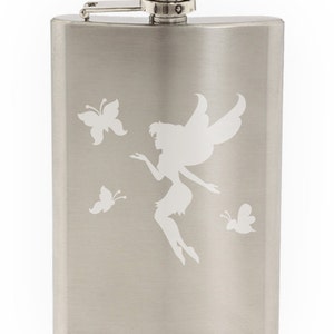 May include: A silver stainless steel flask with a white silhouette of a fairy and butterflies.