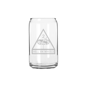 May include: A clear glass can with a white etched design of a triangle with the number "2" and the words "HELL ON WHEELS".