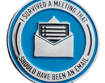May include: A silver and blue round pin with the text "I survived a meeting that should have been an email". The pin features a silver envelope with a white paper inside.