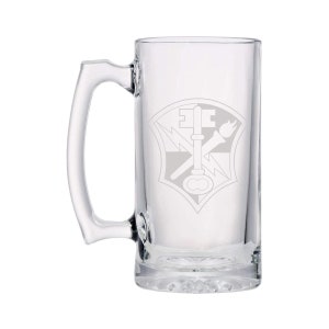 May include: A clear glass beer tankard with a large handle. The tankard has a decorative emblem with a key, lightning bolt, and torch design. The tankard is designed to hold a generous serving of beer.