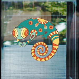 May include: A colourful, patterned chameleon decal with a teal body, yellow and orange accents, and a curled tail. The decal is perfect for adding a whimsical touch to any window or surface.