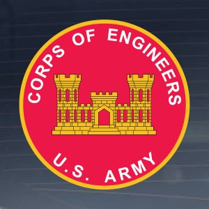 May include: A circular emblem featuring the words "CORPS OF ENGINEERS" and "U.S. ARMY" in white text. The emblem's center displays a gold castle design on a red background, with a yellow border. The design is set against a dark blue gradient.