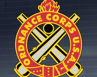 May include: A red and yellow circular emblem with the words "ORDNANCE CORPS U.S.A." around the outside. The centre of the emblem features two crossed cannons with a flame above them.