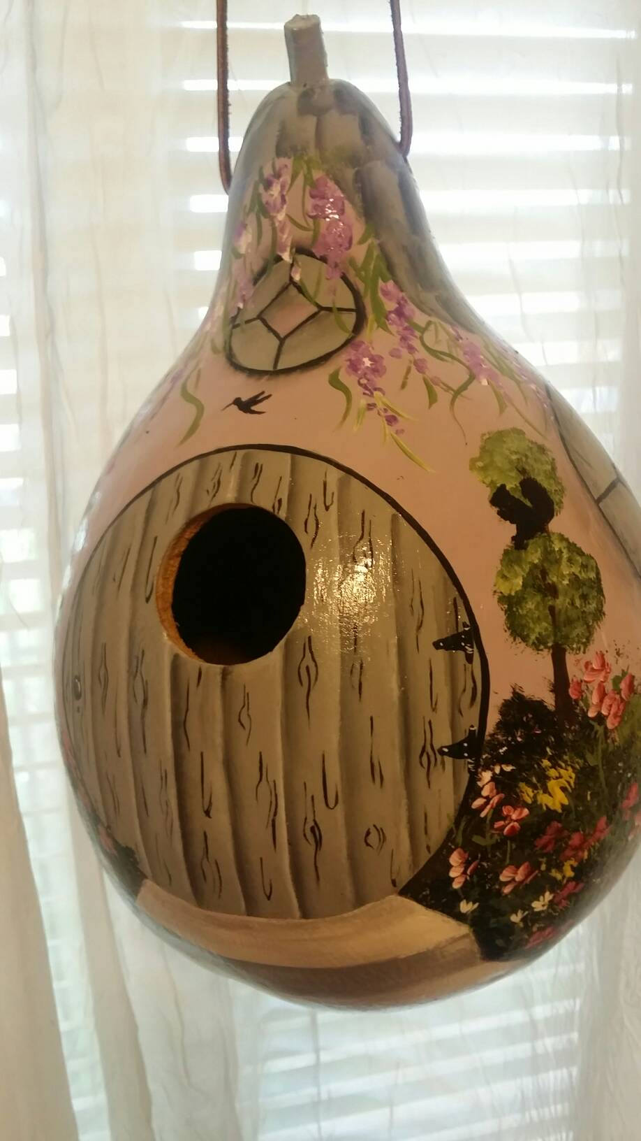 Hand painted gourd birdhouse cottage style. Our lavender gourd is