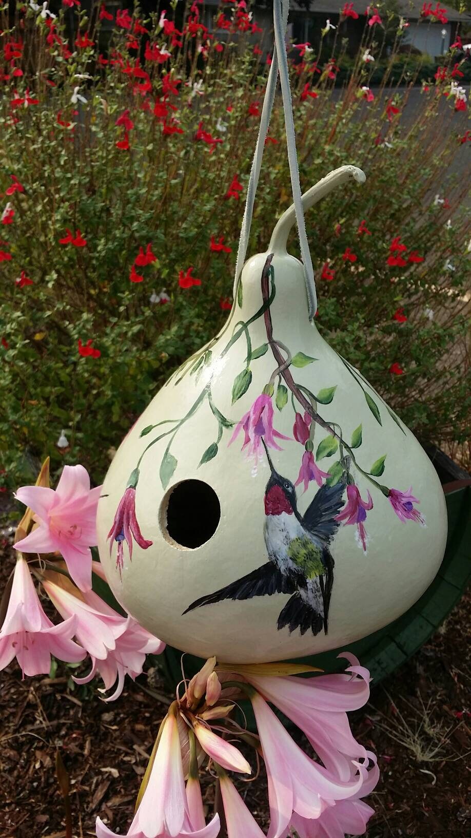 Gourd birdhouse with 2 handpainted hummingbirds decorated with lovely