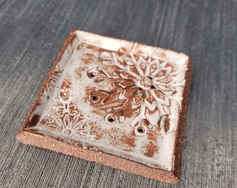 Small square soap dish.