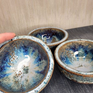 Small crackle shell bowl fine edges.  Handmade here in Ireland.  Each one unique with its own markings