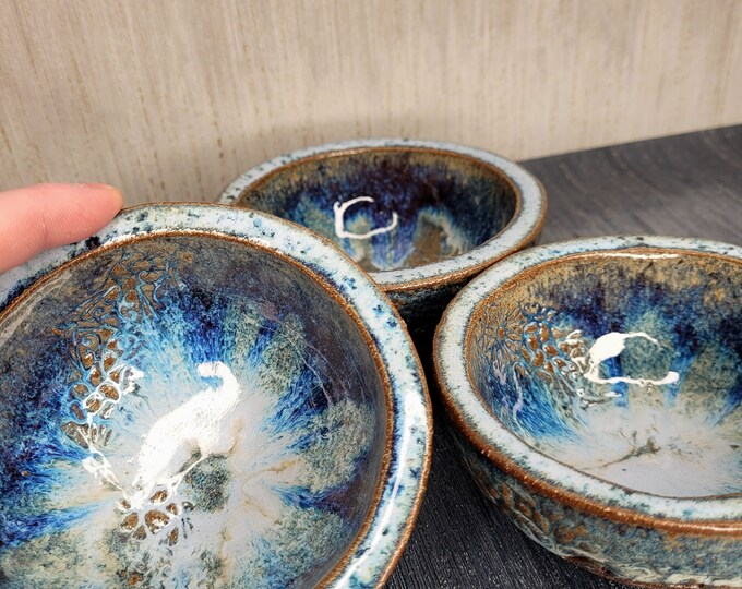 Small crackle shell bowl fine edges.  Handmade here in Ireland.  Each one unique with its own markings