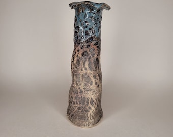 Ceramic vase.  Handmade here in Ireland,  Features a crackled rustic texture.