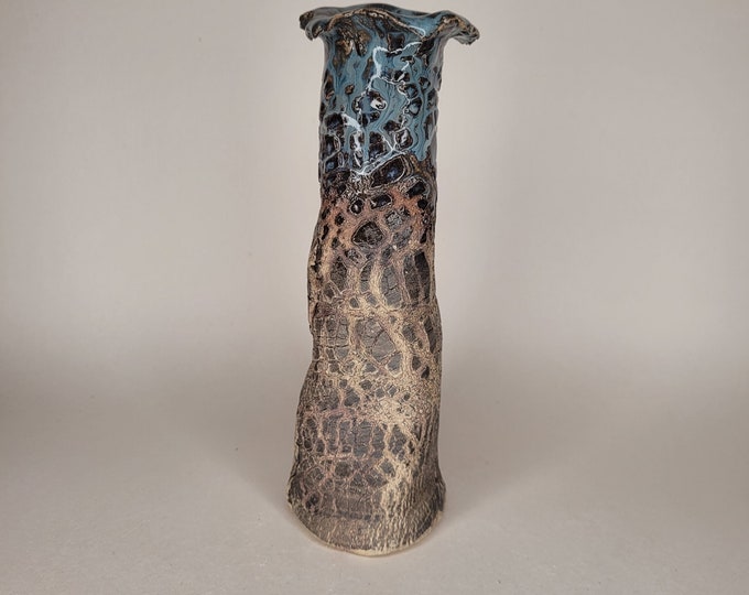 Ceramic vase.  Handmade here in Ireland,  Features a crackled rustic texture.