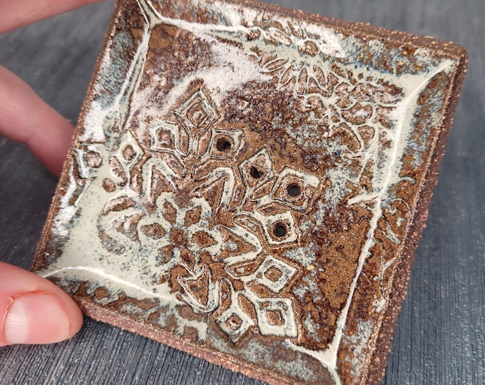 Square soap dish.
