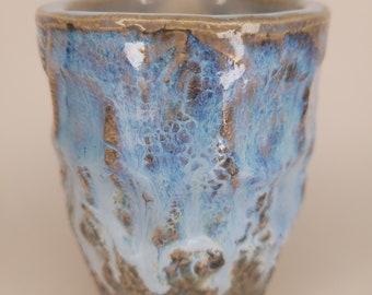 Rustic drinking cup.