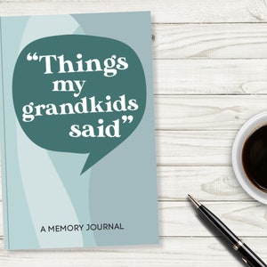 May include: A teal blue journal with the text "Things my grandkids said" in a speech bubble. The journal is labeled "A Memory Journal".