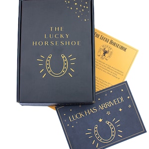 Packaging that accompanies the lucky horseshoe.