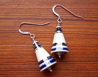 Pretty porcelain cone earrings, white with blue underglaze bands and platinum lustre