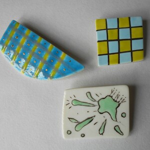 3 Colourful porceain brooches, quirky designs, green/ turquoise/ pale blue glaze + lustres