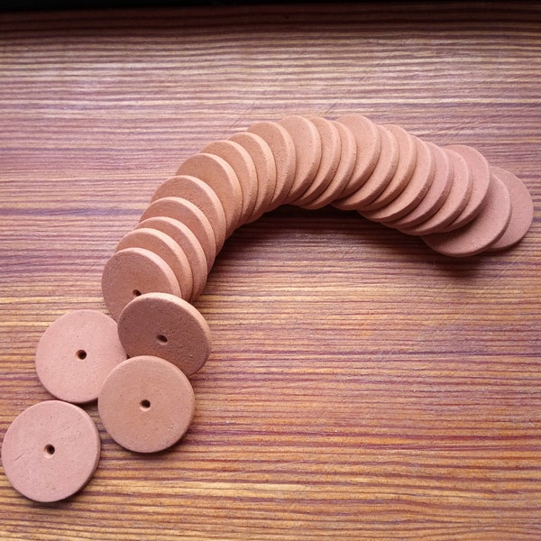 25 terracotta clay discs, 21mm across, single central hole, 2mm thick, plain terracotta for knitting or crafting