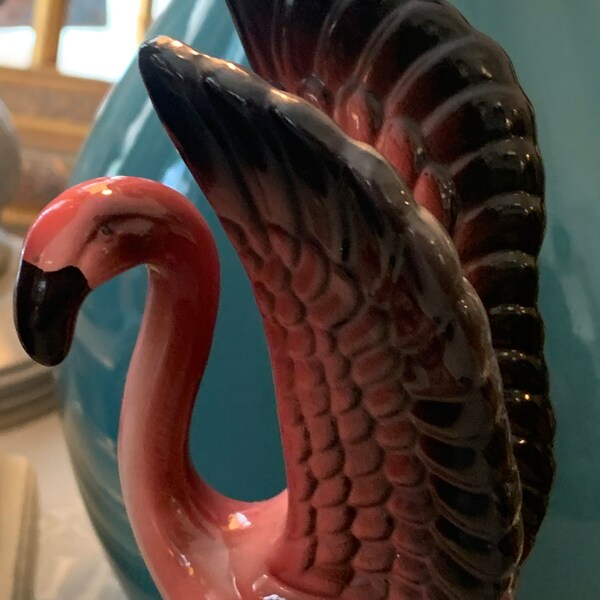 Vintage 1983 MCM flamingo in amazing paint condition. MCM pink and teal. 7 1/2 inches tall. Looks new but bottom is stamped.