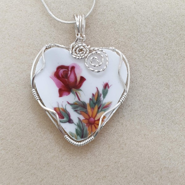 Broken china Heart  pendant.   Red rose-bud.   Wire wrapped in silver.