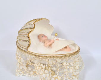 Cradle made from Goose Egg. Tiny porcelain baby with rattle.    Handmade Faberge-like ornament for Christening or birth gift.