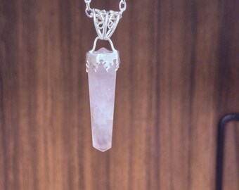 Rose Quartz Crystal Point Pendant.  Delicate pink set in Sterling Silver.