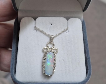 Australian White Opal With Flashes of Bright Colour. Set in Sterling Silver.