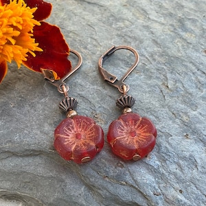 Antique Copper Lever Back Earrings: Red Glass Hibiscus Flower Beads