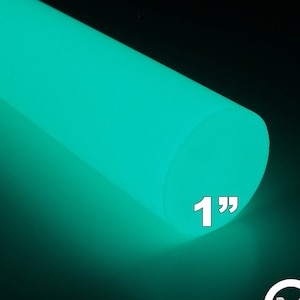 May include: A bright green glow-in-the-dark round rod with a diameter of 1 inch. The rod is made of a material that glows in the dark. The rod is illuminated in the dark.